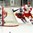 GRAND FORKS, NORTH DAKOTA - APRIL 18: Denmark's Oliver Gatz #6 and Czech Republic's Marek Zachar #6 chase down the puck  while Denmark's Mads-Emil Gransoe #20 looks on during preliminary round action at the 2016 IIHF Ice Hockey U18 World Championship. (Photo by Matt Zambonin/HHOF-IIHF Images)

